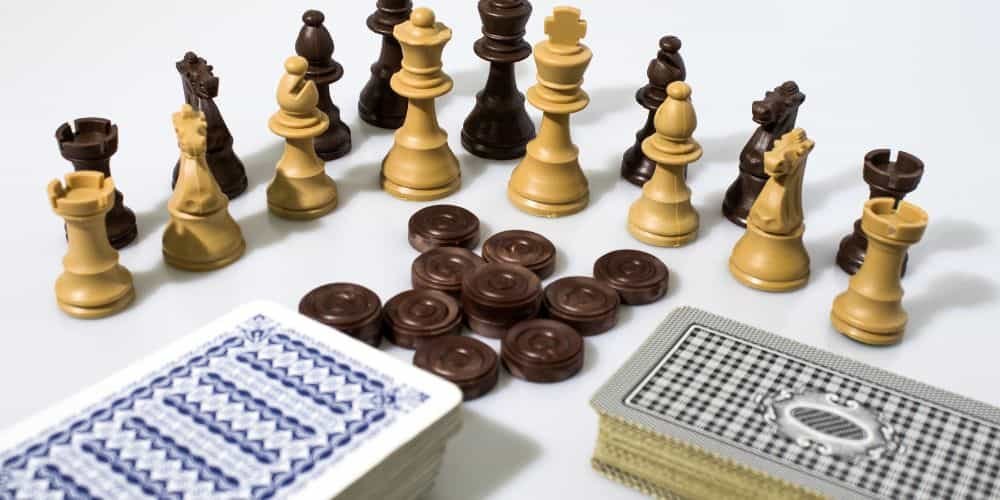 Suits of Playing Cards and Chess Pieces